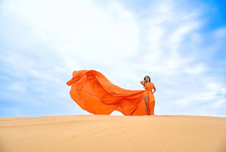 Single orange color flying dress photoshoot in dubai