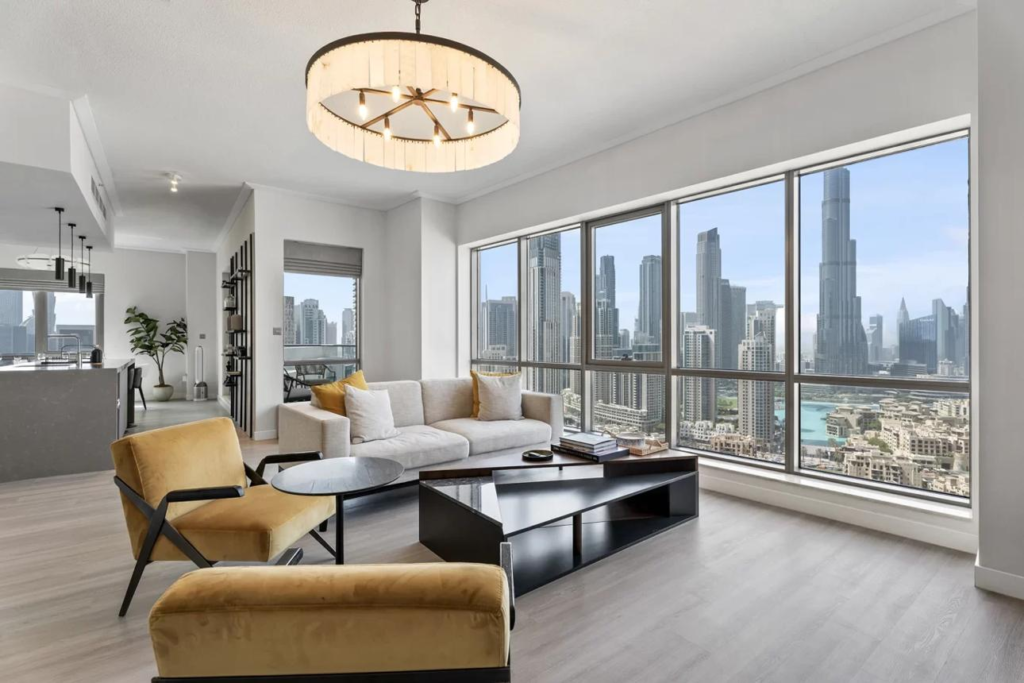 Real estate photography Dubai showcasing a luxury apartment living room with Burj Khalifa views